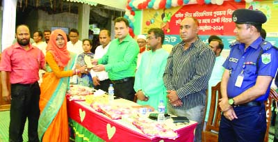 SHERPUR (Bogra): Ashraf Uddin, DC, Bogra distributing prizes among the winners of annual sports of Samit School and College as Chief Guest recently.