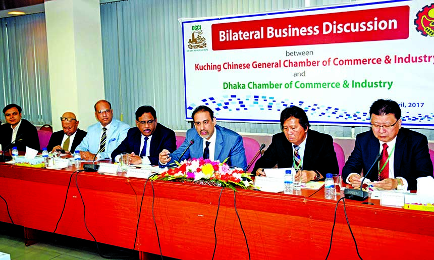 Abul Kasem Khan, President, Dhaka Chamber of Commerce & Industry addressing a discussion with the trade delegation of Kuching Chinese General Chamber of Commerce & Industry, Malaysia in the city on Tuesday. Assistant Agriculture Minister of Sarawak Govern