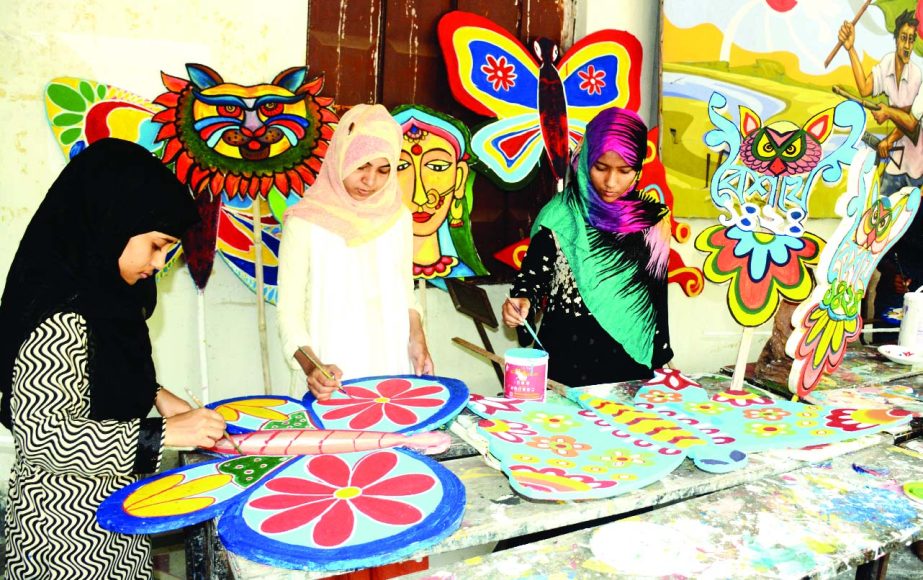 BOGRA: Students of Bogra Art College working taking preparations for Pahela Baishakh yesterday.