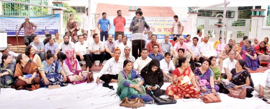 Riaz Haider Chowdhuty, President, Chittagong Journalists' Union speaking at a sit-in -progtamme of Jatiyo Shikkhak Karmochari Front at Chittagong Shaheed Minar demanding Baishakhi allowance on Tuesday.