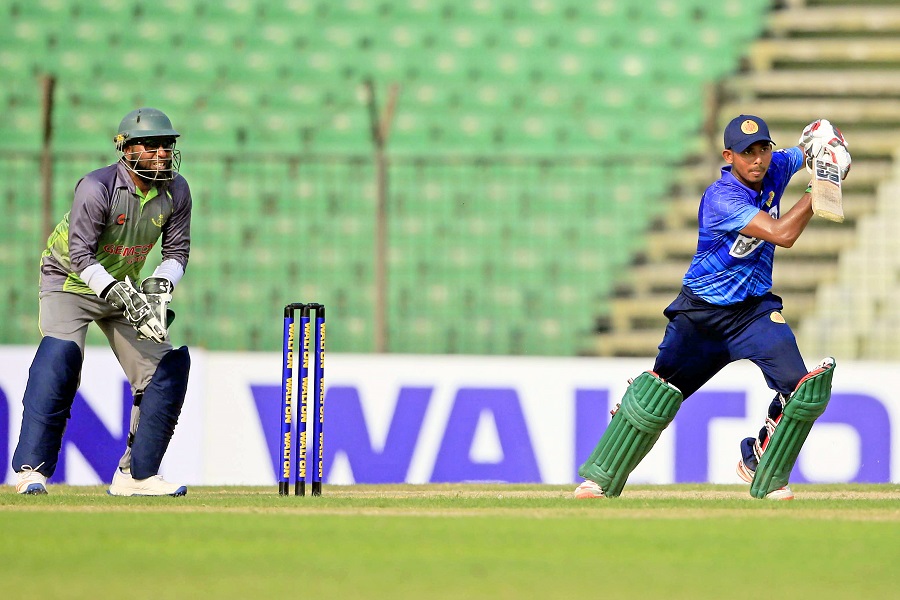 Mosaddek Hossain plays the ball on the up during the Dhaka Premier League match between Abahani and Khelaghar Samaj Kalyan Samity at Khan Shaheb Osman Ali Stadium in Fatullah on Wednesday.