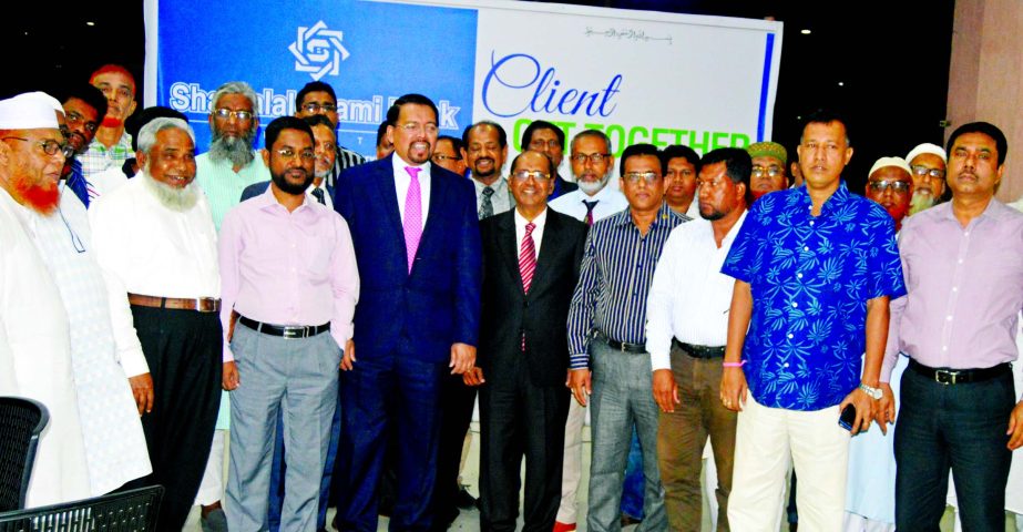 Engineer Md Towhidur Rahman, Chairman, Board of Directors of Shahjalal Islami Bank Ltd, poses with the participants of â€˜Client Get Together Programmeâ€™ at a hotel in Khulna recently. Md Sanaullah Shahid, EC Chairman, Farman R Chowdhury, Managi