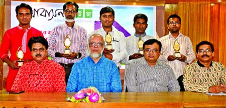 Real Estate sector based specialized news portal 'abashonnews24.com' awarded six journalists of the year in six categories at a city auditorium on Friday. The awardees are: (1) Moin Ahamed, Senior Photo Journalist of The New Nation, (2) Sanaullah Hoque,