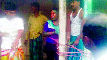 An 11-year old boy Masud Rana tortured by trying with pillar for smparing colours in Kurigram's Bhurangamari upazila on Friday.