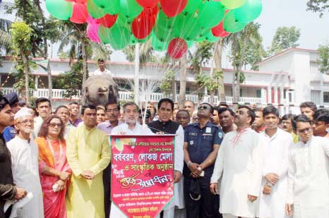 Chairman of the Parliamentary Standing Committee on Ministry of Railway ABM Fazle Karim Chowdhury MP inaugurating the Cultural Fair on the occasion of Pahela Baishakh by releasing balloons and festoons as Chief Guest as Raozan College ground on Friday