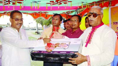 RAMPAL(Bagerhat): Talukder Abdul Khalek MP distributing prizes among the winners of football tournament on the occasion of Baishakhi Mela on Sunday.