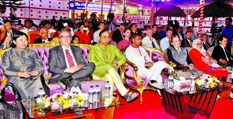 Inspector General of Police AKM Shahidul Hoque along with other distinguished persons at a programme at Diplomatic Security Division office in the city's Gulshan on Monday in observance of Bangla New Year.