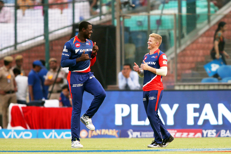 Sam Billings and Carlos Brathwaite commemorate Colin de Grandhomme's wicket with a celebratory jig during the IPL 2017 match between Kolkata Knight Riders and Delhi Daredevils at Delhi on Monday.
