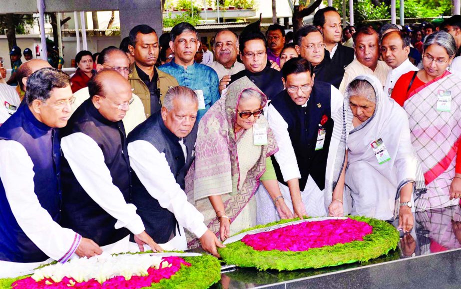 Prime Minister Sheikh Hasina along with party leaders paid tributes to Bangabandhu Sheikh Mujibur Rahman by placing wreaths at the portrait of great leader at Dhanmondi-32 on the occasion of historic Mujibanagar Day on Monday.