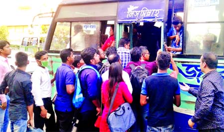 Many became stranded as fewer buses plied in the city routes following withdrawal of so-called 'Gate Lock' and 'Sitting Service' buses for 2nd day on Monday. This photo was taken from Kawran Bazar area.