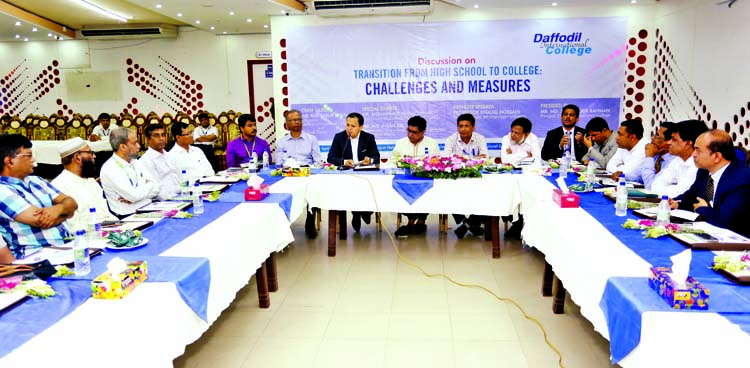 Chairman of Daffodil Family Sabur Khan, among others, at a discussion on 'Transition from High School to College: Challenges and Measures' at Daffodil Tower in the city on Tuesday.