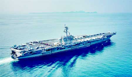The U.S. aircraft carrier USS Carl Vinson transits the Sunda Strait, Indonesia, now heading towards Australia. Internet photo