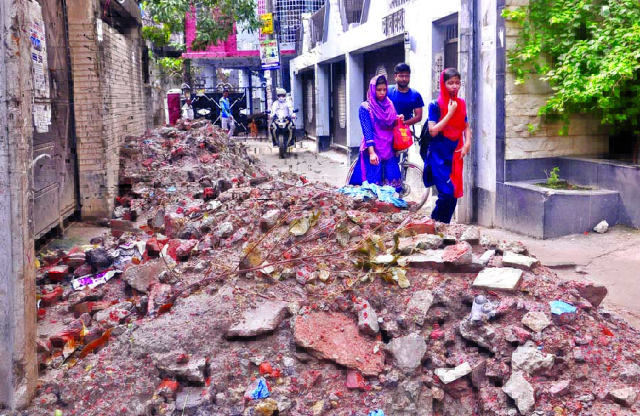 The photograph shows the dilapidated condition of the Baganbari Road No. 36, South Goran under Khilgaon PS. Dhaka. WASA dug the road about one and a half months ago for renovation the sewerage line. Since then, the road has been left deserted. The snap wa