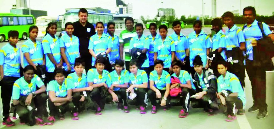 Members of Bangladesh Under-16 Women's Football team pose for a photograph in China on Thursday. Bangladesh Under-16 Women's Football team are now staying in China to play five exhibition matches against the different teams of China.