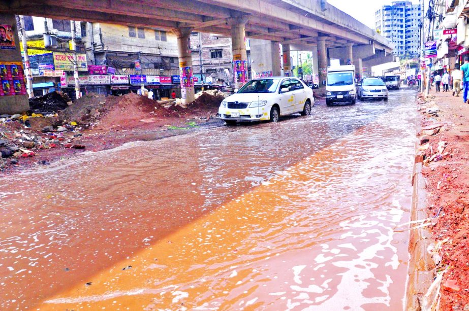 City's Shantinagar area submerged by the rain water under Malibagh flyover towards Kakrail crossing causing sufferings to commuters. This photo was taken on Thursday.