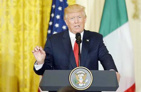 President Donald Trump speaks during a news conference with Italian Prime Minister Paolo Gentiloni in the East Room of the White House in Washington on Thursday.