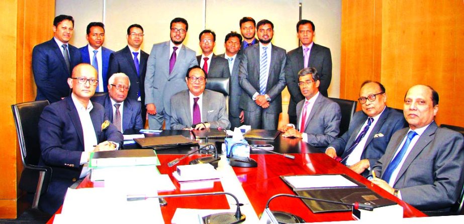 A Rouf Chowdhury, Chairman, Board of Directors of Bank Asia Ltd, presiding over a meeting at the bank head office in the city recently. A M Nurul Islam, Vice Chairman, Rumee A Hossain, EC Chairman, Mashiur Rahman, Audit Committee Chairman and Md. Arfan Al