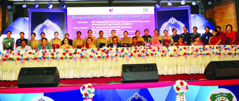 Home Minister Asaduzzaman Khan Kamal, among others, at Bangladesh Women Police Award giving ceremony organised by Bangladesh Police Headquarters at Mirpur Police Staff College in the city on Friday.