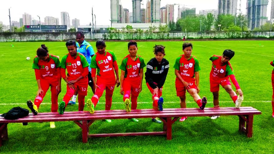Members of Bangladesh Under-16 National Women's Football team during their practice session at the Xian Olympic Village Centre in China on Friday.