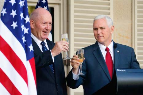 US Vice President Mike Pence Â® and Australia's Governor General Peter Cosgrove toast each other during a lunch reception in Sydney.