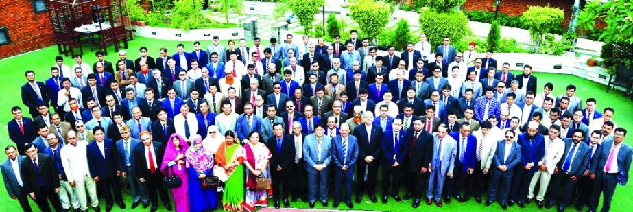 Syed Waseque Md Ali, Managing Director of First Security Islami Bank Limited, poses with the participants of Quarterly Business Conference of Dhaka and Barisal Zone at a city hotel on Friday. Osman Ali, Syed Habib Hasnat, AMDs, Abdul Aziz, Md Mustafa Khai