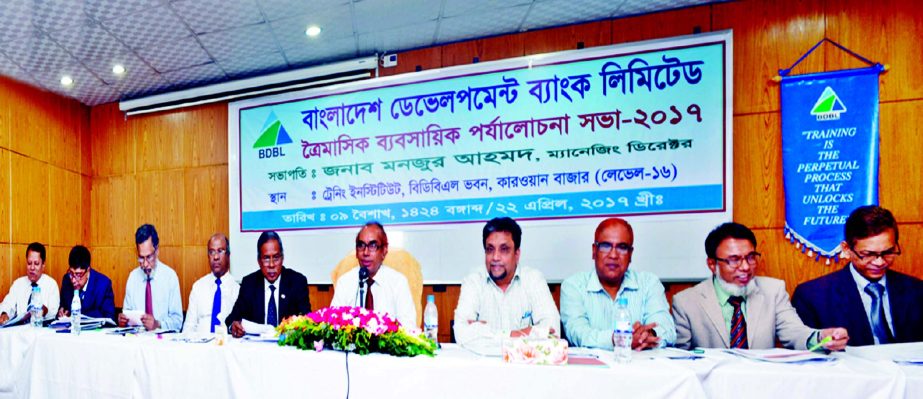 Manjur Ahmed, Managing Director of Bangladesh Development Bank Limited, presiding over its Quarterly Business Review Meeting-2017 at the bank's training institute in the city on Saturday. All General Managers, Branch Managers and concerned officials of t