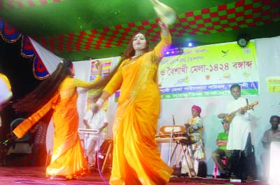 MODHUKHALI( Faridpur):Artists of Lalon Sangeet Academy, Kushtia rendering songs at a Baishakhi Mela at Modhukhali recently.