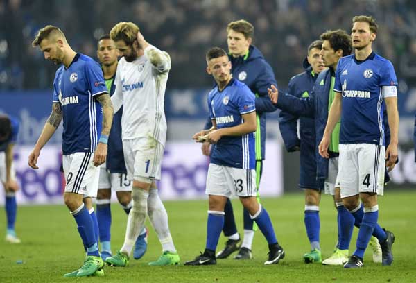 Schalke's team leaves the pitch disappointed after the Europa League quarterfinal second leg soccer match between FC Schalke 04 and Ajax Amsterdam in Gelsenkirchen, Germany. Schalke missed to reach the semifinal on Thursday.