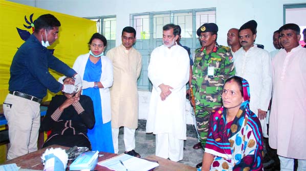 ABM Fazle Karim Chowdhury MP and Director of Chittagong Medical College Hospital Brig.Gen. Dr. Jalaluddin seen witnessing the free medical camp services arranged at Raozan on Friday.