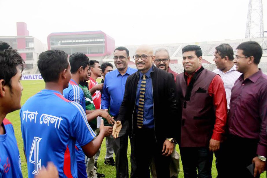 Deputy Minister for Youth and Sports Arif Khan Joy being introduced with the participants of the opening match of the Walton Under-18 National Football Championship at the Bangabandhu National Stadium on Sunday.