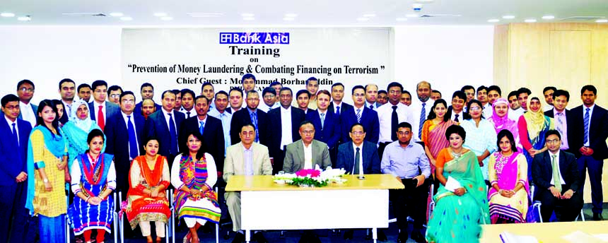 Mohammad Borhanuddin, DMD of Bank Asia Ltd, poses with the participants of a training program me on "Prevention of Money Laundering & Combating Financing on Terrorism" at the banks Institute for Training & Development in the city recently. Md Zia Arfin,