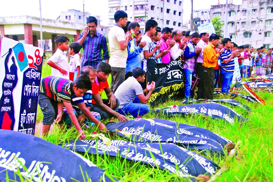 Family and relatives of the Rana Plaza victims gathered at the Jurain graveyard and offered prayers for the salvation of the departed souls on Monday. The nine-storied Rana Plaza garment factory collapsed on April 24, 2013, killing over 1,130 people mostl