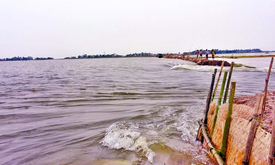 Another Urar Bondho Dam at Paknar Haor in Jamalganj and Diraj Upazilas in Sunamganj breached at various points early Monday due to on-rush of waters from upper stream and heavy downpour.