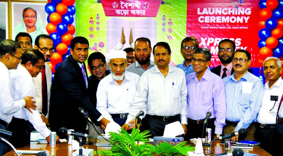 Amin Uddin Ahmed, Deputy Managing Director of Sonali Bank Limited, inaugurating 3-day Remittance Campaign with Xpress Money Bangladesh at the bank head office in the city on Tuesday. Tariqul Islam Chowdhury, DMD, Md Ataur Rahman, GM, Abul Layes Afsary, DG