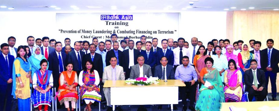 Mohammad Borhanuddin, Deputy Managing Director and Chief Operating Officer of Bank Asia, poses with the participants of a day-long training programme titled "Prevention of Money Laundering & Combating Financing on Terrorism" at its Training Institute a