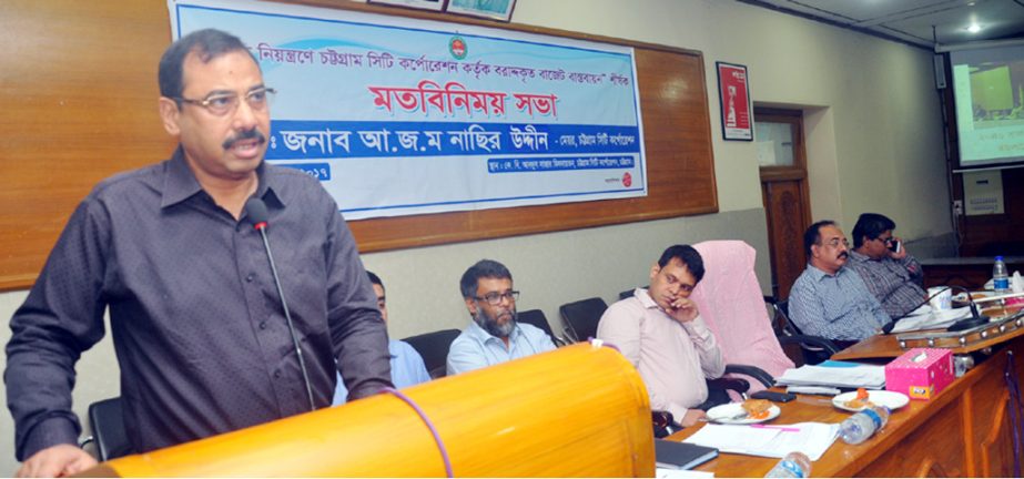CCC Mayor A J M Nasir Uddin addressing a view exchange meeting on budget implementation on tobacco control by CCC at K B Abdus Sattar Auditorium yesterday.