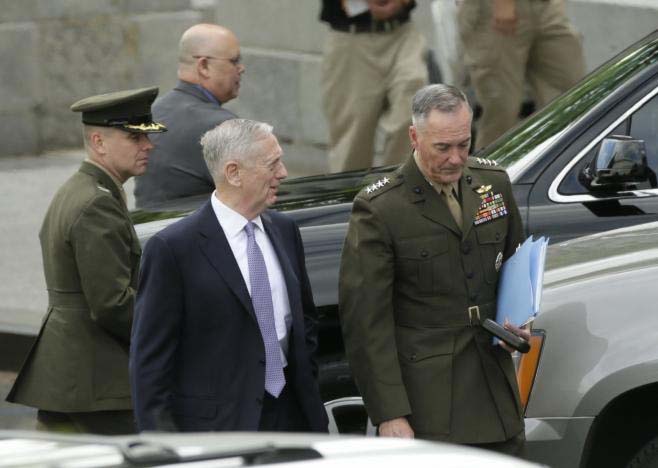 US Defense Secretary James Mattis and Joint Chiefs Chairman General Joseph Dunford depart after briefing members of the US Senate on North Korea at the White House in Washington on Wednesday.