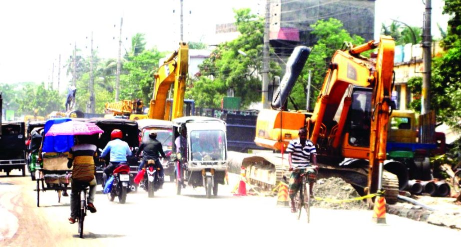 KHULNA: Road digging by KWASA is going on unabated causing immense sufferings to city dwellers. This snap was taken from WDB Office point on Khulna-Jessore highway on Wednesday noon.