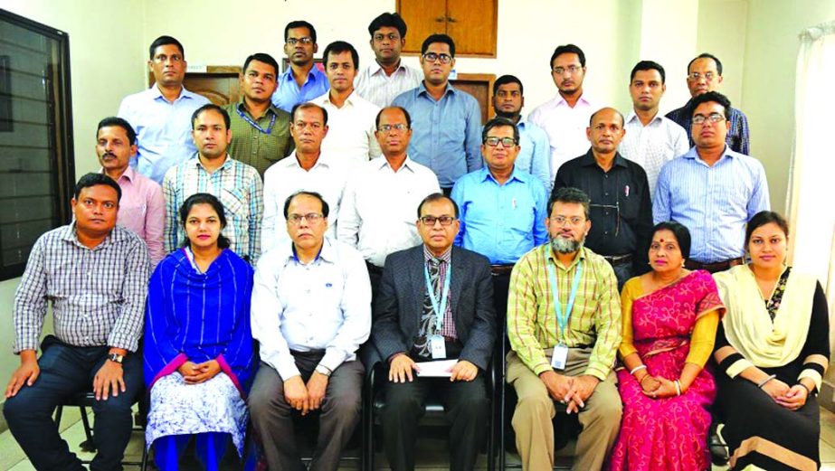 Md Abdus Salam, Managing Director of Janata Bank Limited, poses with the participants of a day-long course on "Financing in Green Products" at the bank staff college in the on Thursday. Kazi Golam Mostafa, DGM, Arif Ahmed, AGM and a total of 21 officers