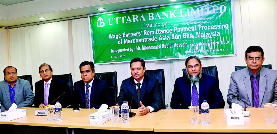 Mohammed Rabiul Hossain, Managing Director of Uttara Bank Limited, addressing at the Training Programme on "Wage Earners Remittance Payment Processing of Merchantrade Asia Sdn Bhd, Malaysia" at the bank head office in the city recently. Mohammed Moshara