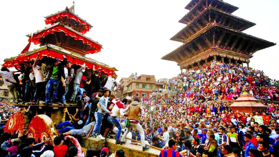 People throng the Nyatapola Temple in Bhaktapur to celebrate the nine-day long festival. (Navesh Chitrakar/REUTERS)