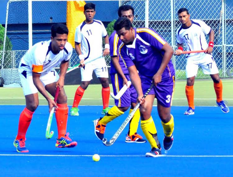 A view of the ATN Bangla 31st National Hockey Gold Cup between Bangladesh Navy and Gazipur District team at the Moulana Bhashani National Hockey Stadium on Thursday.