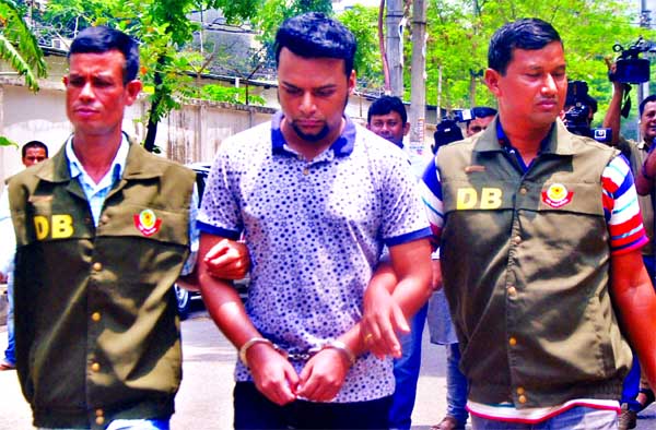 CTTC unit of DMP arrested a man who was allegedly involved for threatening to blow up Australian High Commission in Dhaka. This photo was taken from DB office on Friday.