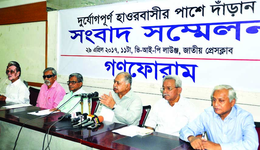 Gonoforum President Dr Kamal Hossain speaking at a press conference at the Jatiya Press Club on Saturday urging all to stand beside flood-affected haor people.