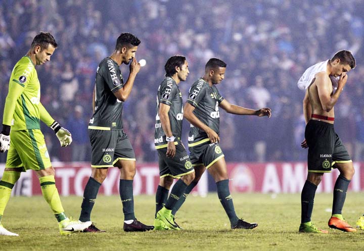 Brazil's Chapecoense players leave the field after losing a Copa Libertadores soccer match 3-0 to Uruguay's Nacional in Montevideo, Uruguay on Thursday.