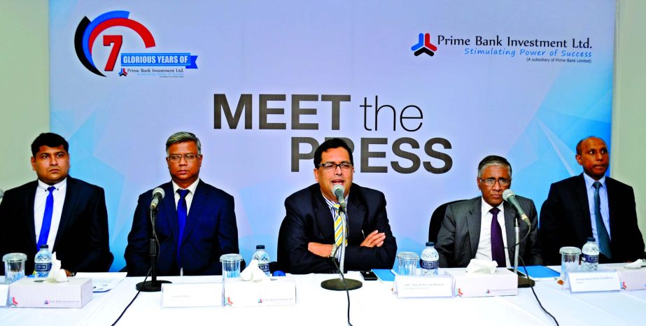 Md Tabarak Hossain Bhuiyan, Managing Director and CEO of Prime Bank Investment Ltd, addressing at a press conference at its head office on Sunday. Ahmed Kamal Khan Chowdhury, Director of PBIL and Managing Director of Prime Bank Ltd and other senior offici