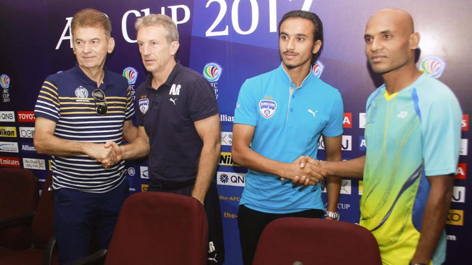 Coach of Dhaka Abahani Limited Drago Mamic (left) shaking hands with Coach of JSW Bengaluru of India Alberto Roca Pujo (second from left), while Captain of Dhaka Abahani Limited Mamun Mia (right) and Captain of JSW Bengaluru of India Gursimrat Singh Gill
