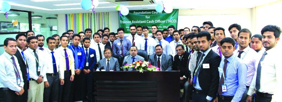 Syed Habib Hasnat, Additional Managing Director of First Security Islami Bank Ltd, poses with the participants of 22nd Foundation Training Course at the bank training institute in the city on Saturday. Md Mustafa Khair, DMD of the bank, Md Ataur Rahman, P