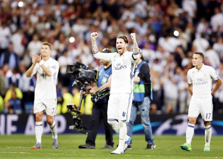 Real Madrid's Sergio Ramos celebrates at the end of the match after the Champions League semifinal first leg soccer match between Real Madrid and Atletico Madrid at the Santiago Bernabeu stadium in Madrid, Spain on Tuesday.