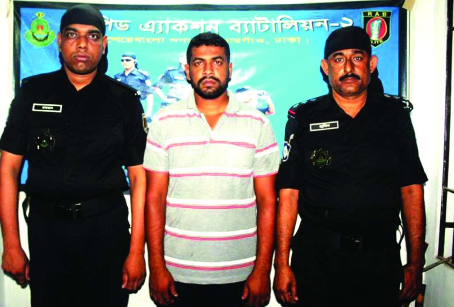 RAB arrested one warranted accused of banned Hijbut Tahirir from city's Adabor area yesterday.